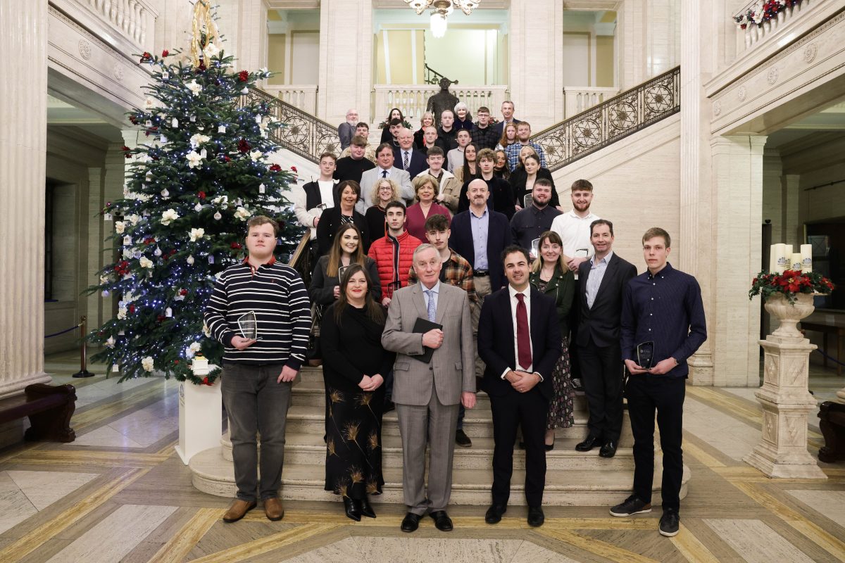 Group photo of NI Traineeship Award winners at Stormont on 29 November 2023 with College Principals and DfE staff